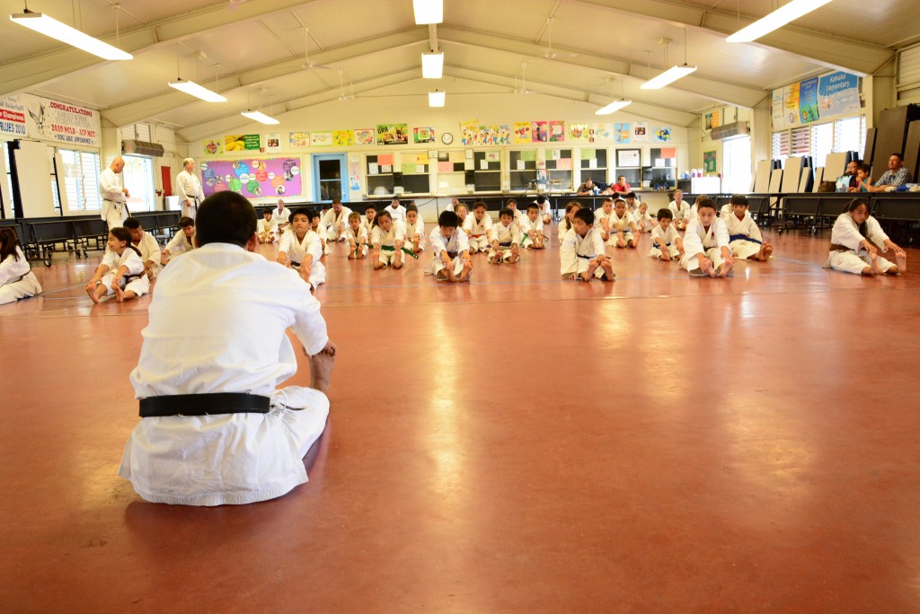 Participants warm-up during a 3-hour seminar, a day before the tournament